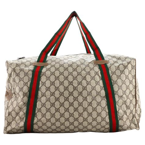 gucci weekender duffle bag.